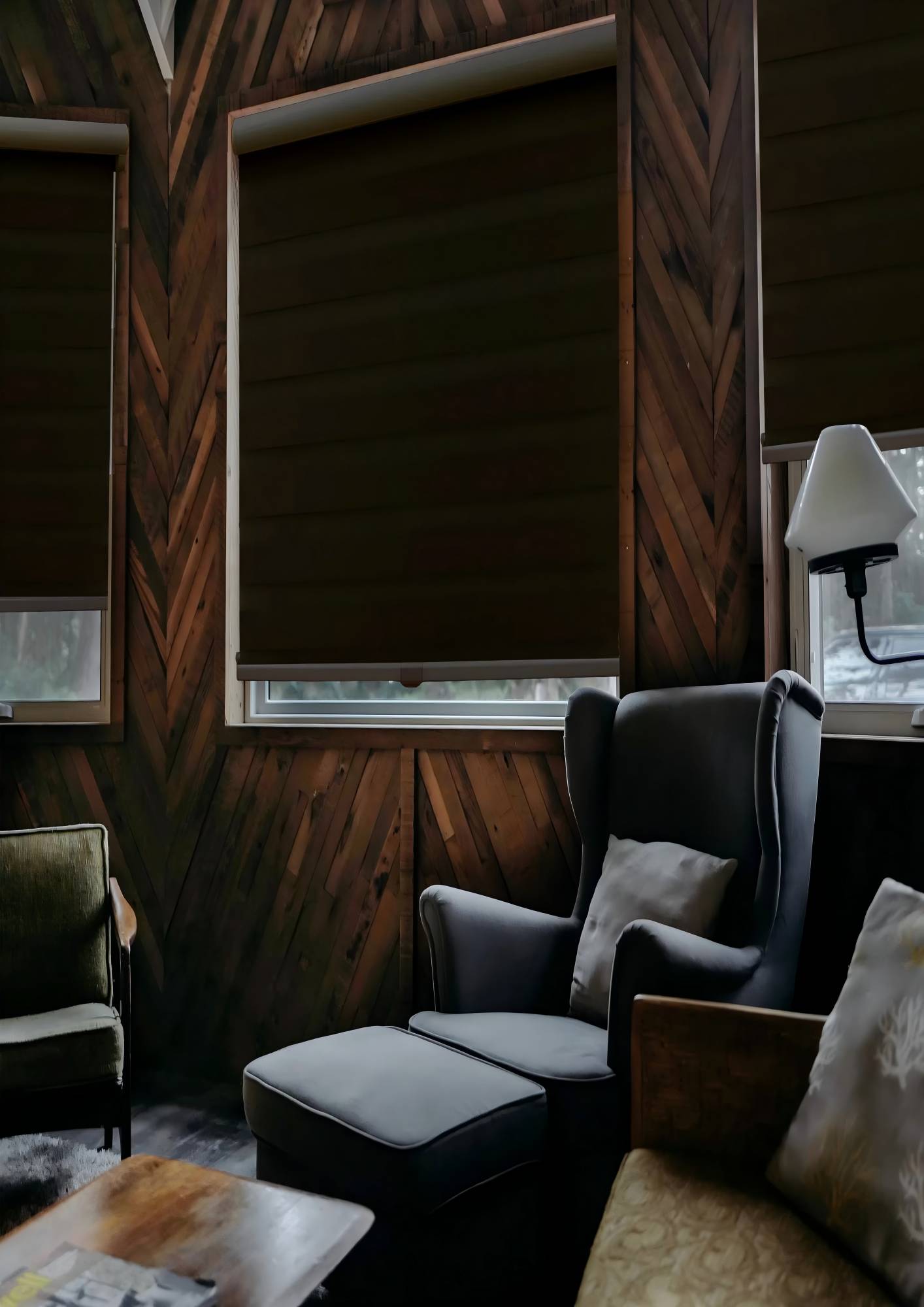 Room-darkening zebra blind in a dark lounge