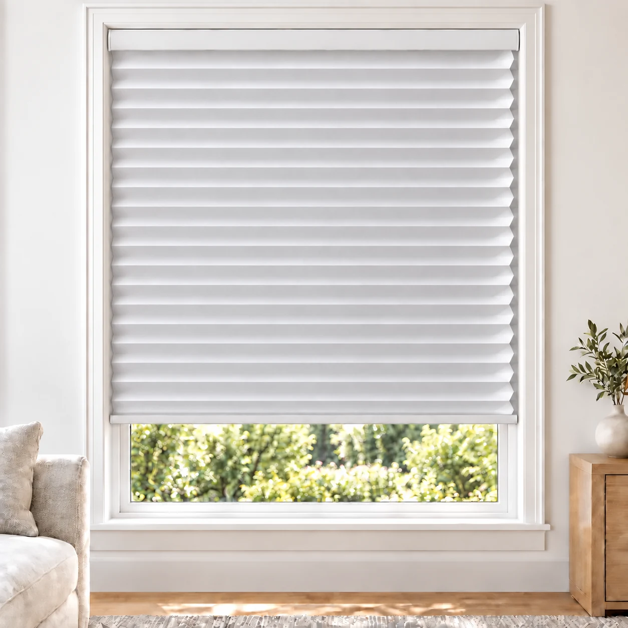 Pearl White 38mm honeycomb cellular blind in a bright neutral living room, fabric B01-38, blackout