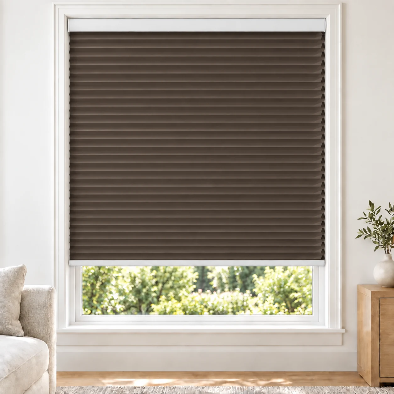 Cocoa Brown 25mm honeycomb cellular blind in a bright neutral living room, fabric B02, blackout