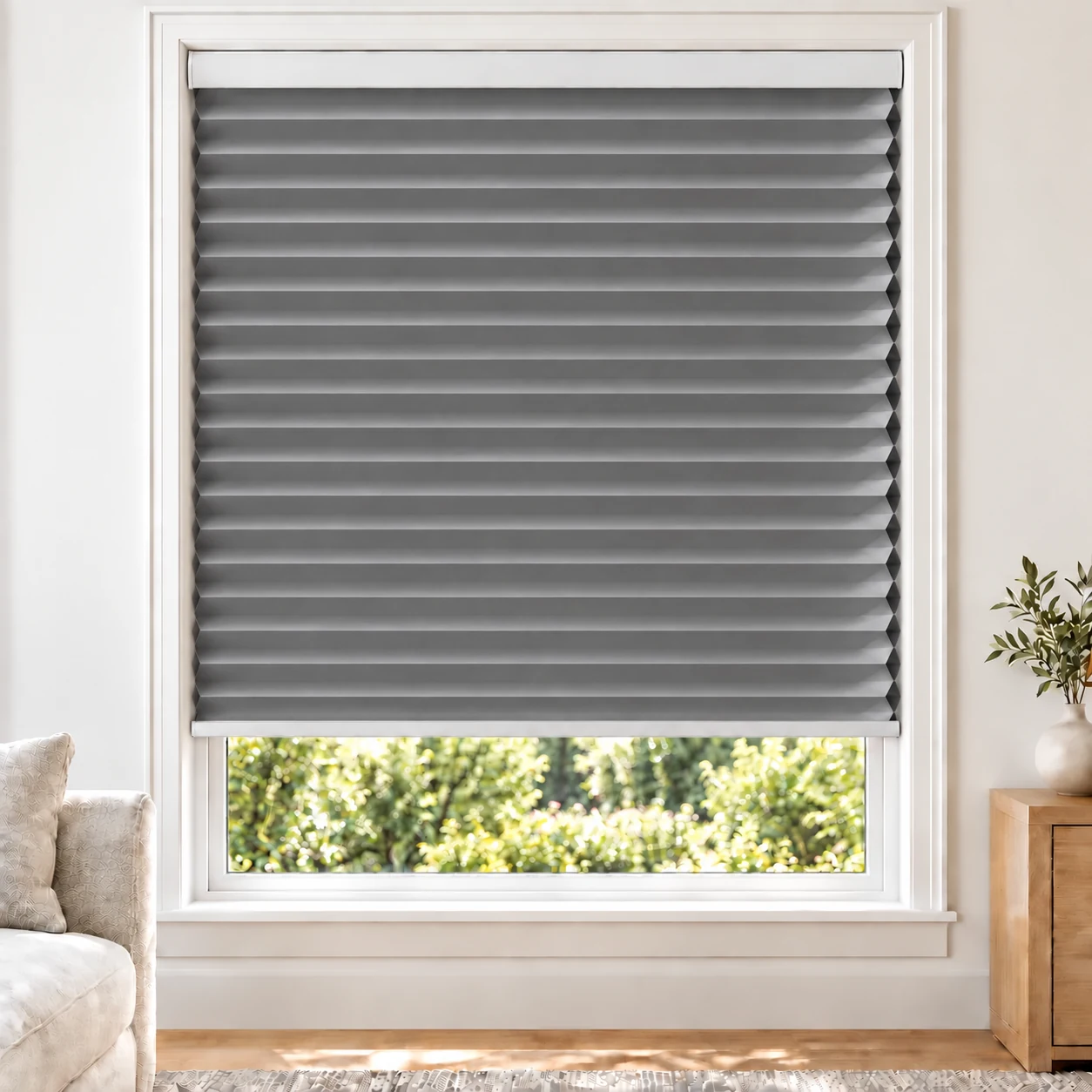 Ash Grey 38mm honeycomb cellular blind in a bright neutral living room, fabric B03-38, blackout