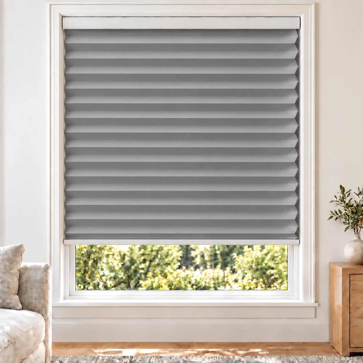 Ash Grey 45mm honeycomb cellular blind in a bright neutral living room, fabric B03-45, blackout