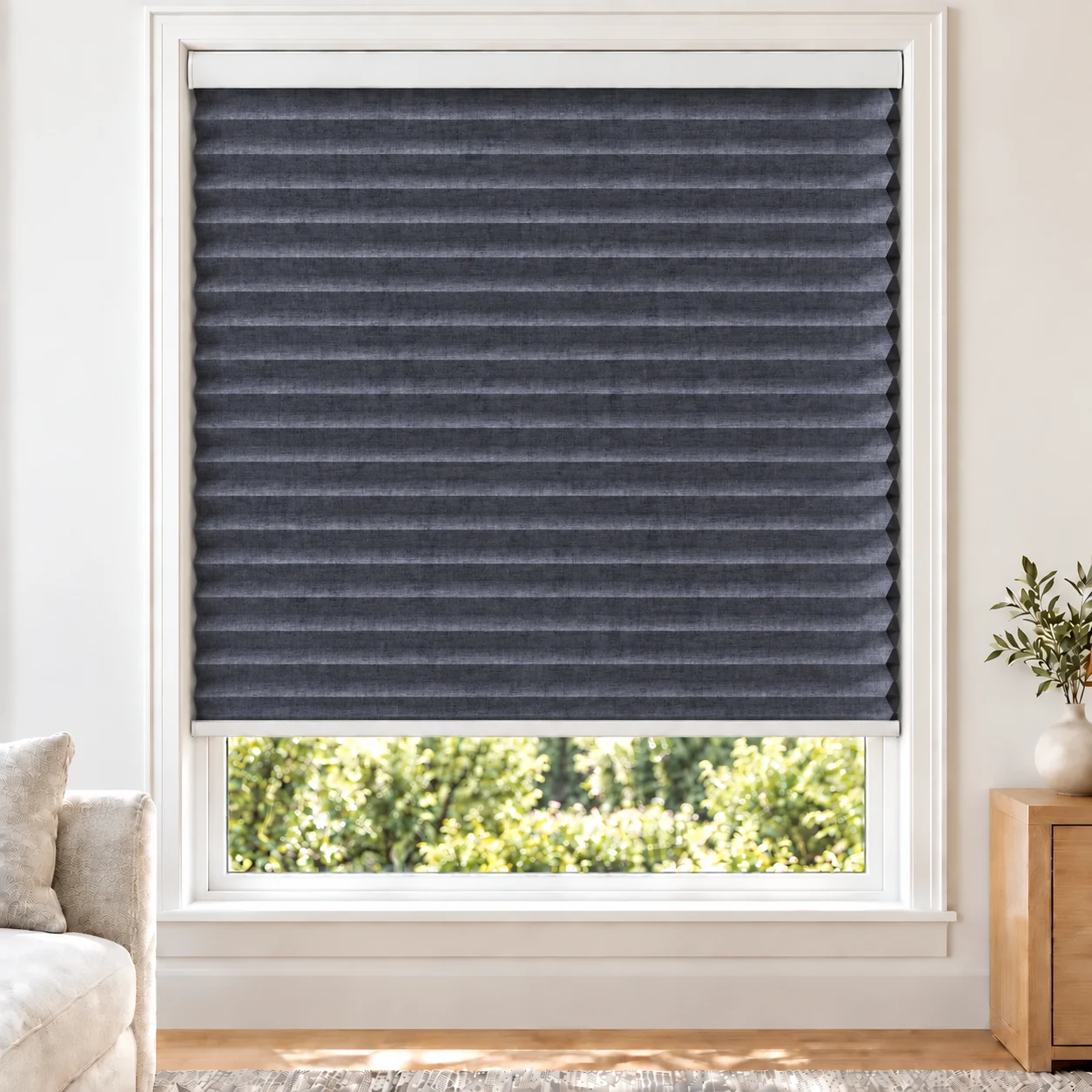 Denim Heather 38mm honeycomb cellular blind in a bright neutral living room, fabric BMF17-38, blackout