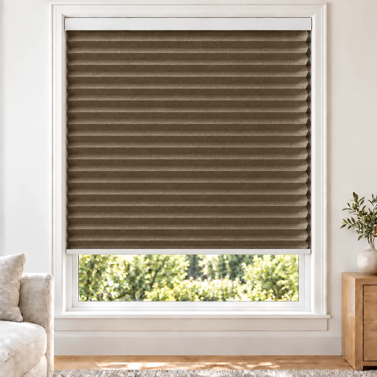 Bronze Weave 38mm honeycomb cellular blind in a bright neutral living room, fabric BYM06-38, blackout