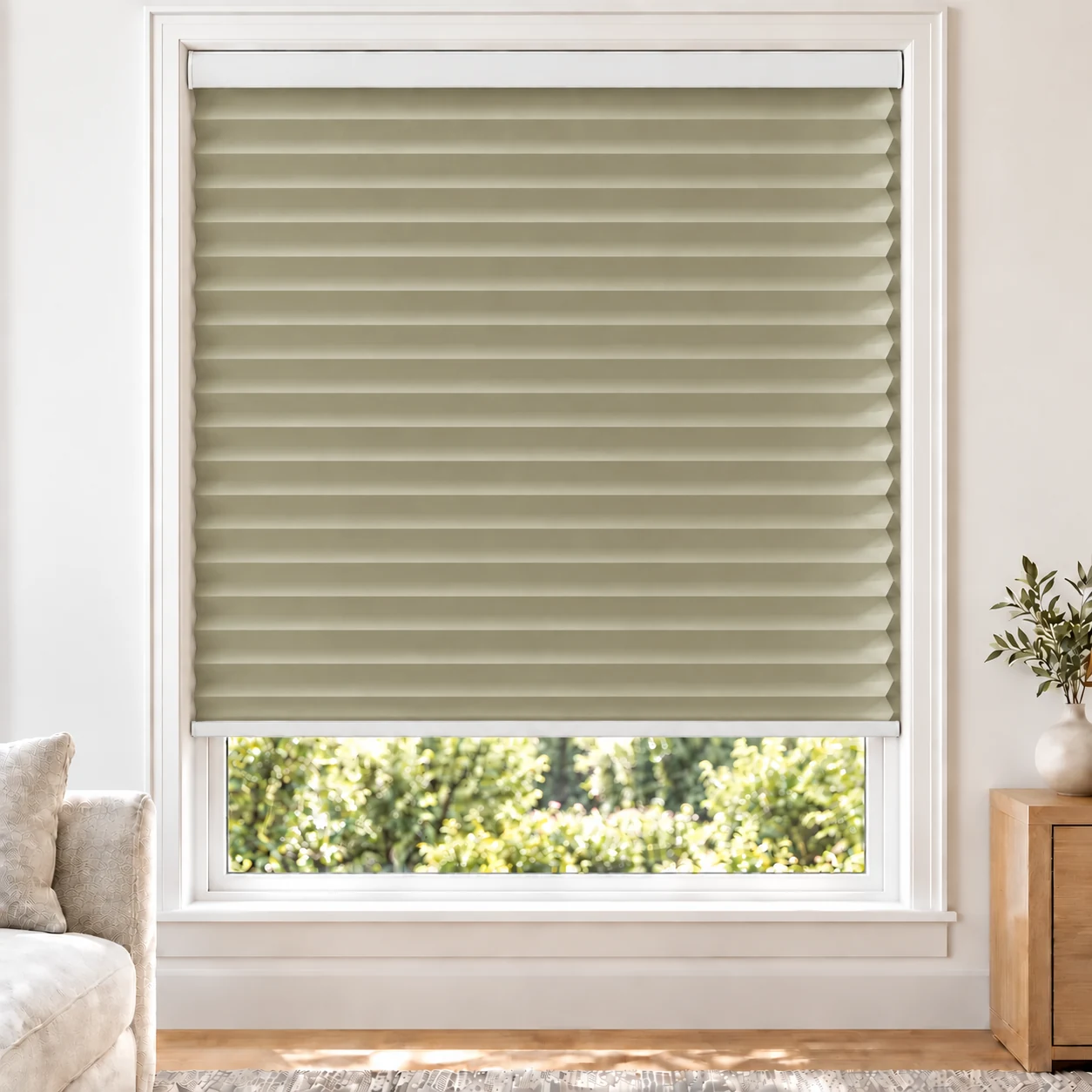 Olive Sand 38mm honeycomb cellular blind in a bright neutral living room, fabric L06-38, 70% shading