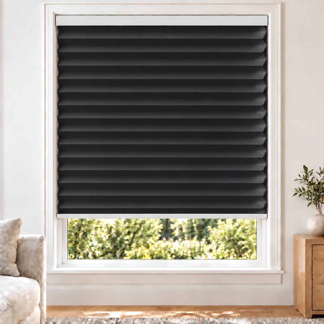 Onyx Black 45mm honeycomb cellular blind in a bright neutral living room, fabric L10-45, 70% shading