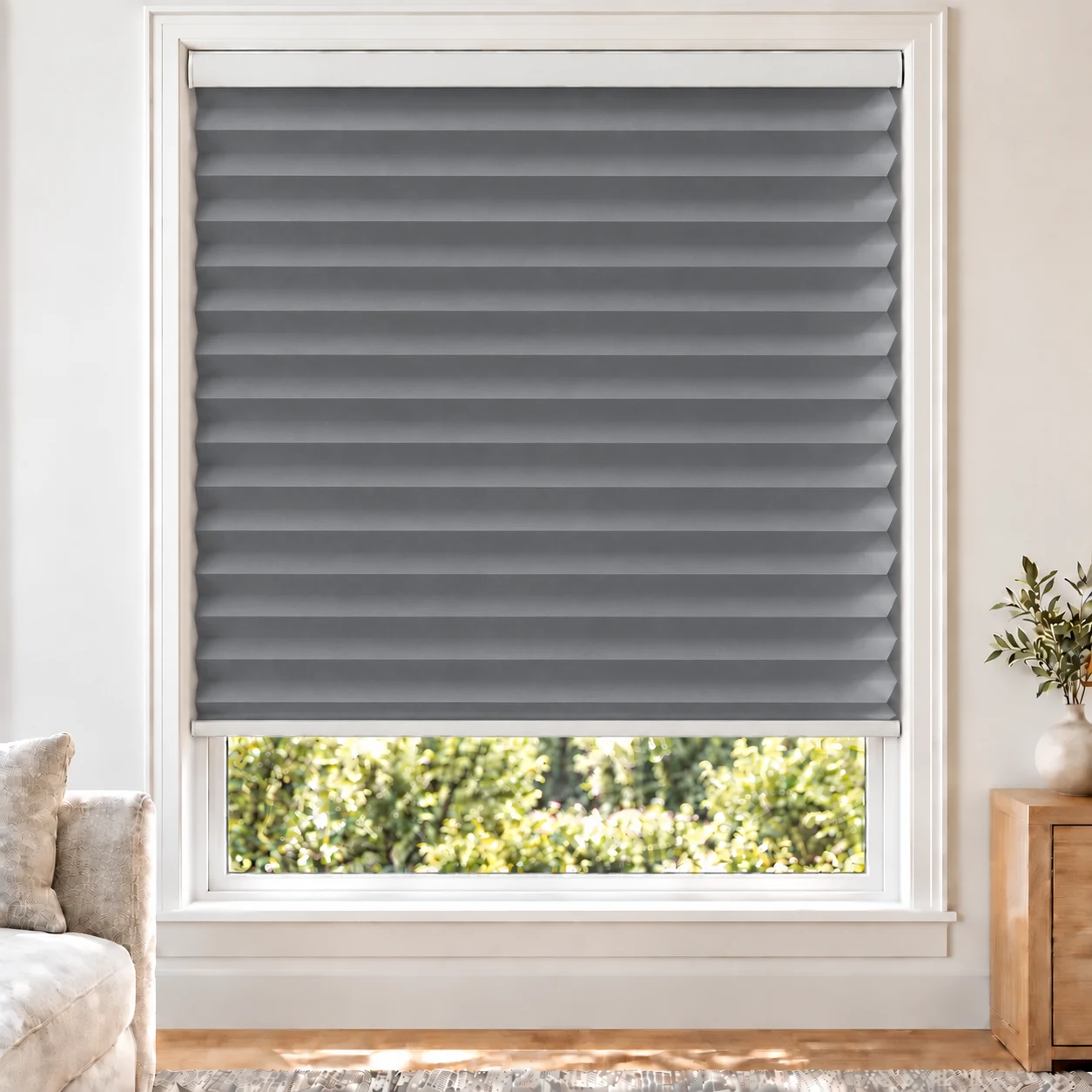 Slate Grey 45mm honeycomb cellular blind in a bright neutral living room, fabric L12-45, 70% shading