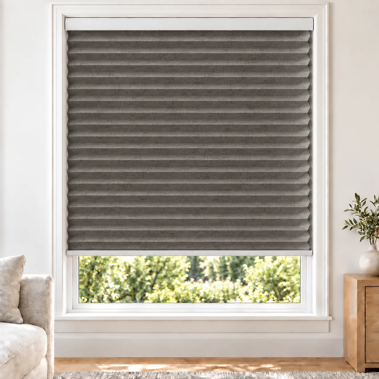 Stone Heather 38mm honeycomb cellular blind in a bright neutral living room, fabric LMF15-38, 70% shading