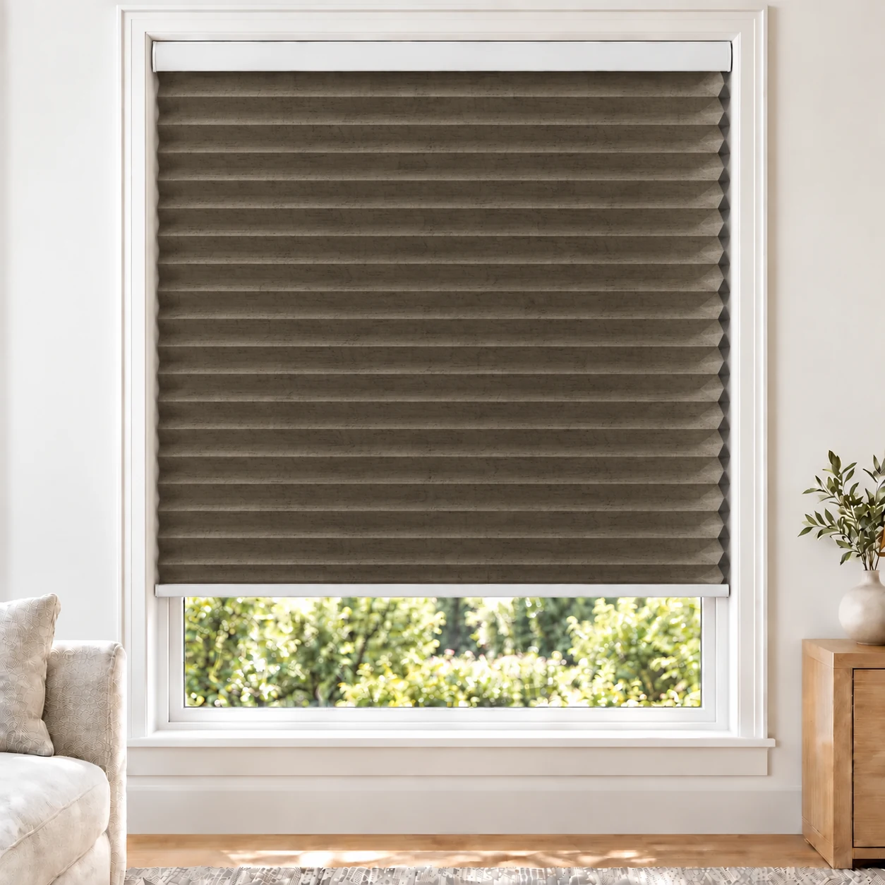 Bronze Heather 38mm honeycomb cellular blind in a bright neutral living room, fabric LMF16-38, 70% shading