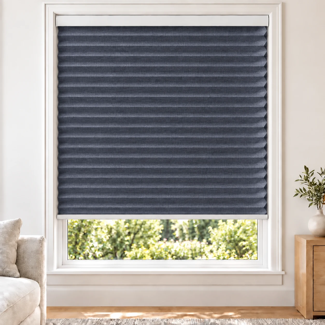Denim Heather 38mm honeycomb cellular blind in a bright neutral living room, fabric LMF17-38, 70% shading