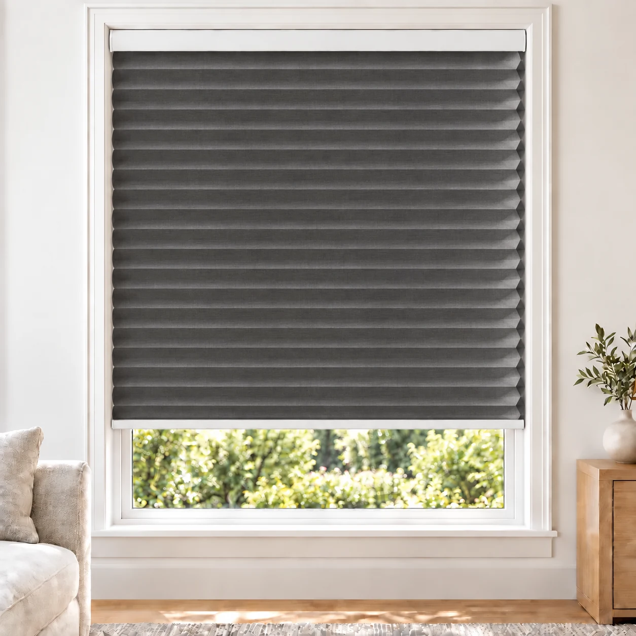 Graphite 38mm honeycomb cellular blind in a bright neutral living room, fabric LTH03-38, 70% shading