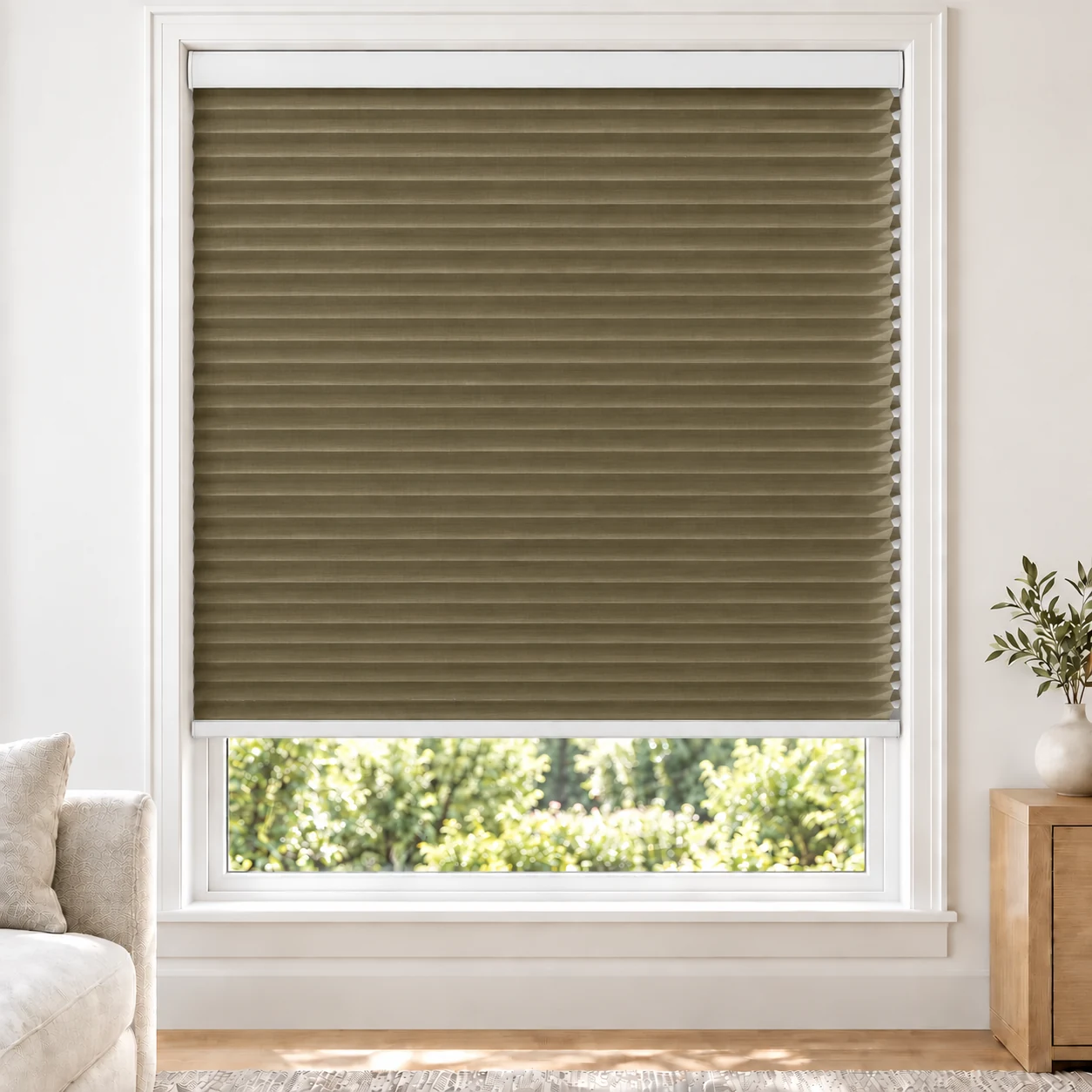 Antique Bronze 25mm honeycomb cellular blind in a bright neutral living room, fabric LTH06, 70% shading