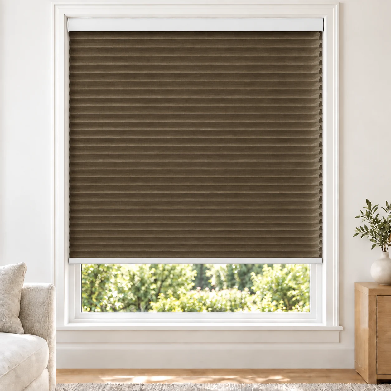 Walnut 25mm honeycomb cellular blind in a bright neutral living room, fabric LTH08, 70% shading