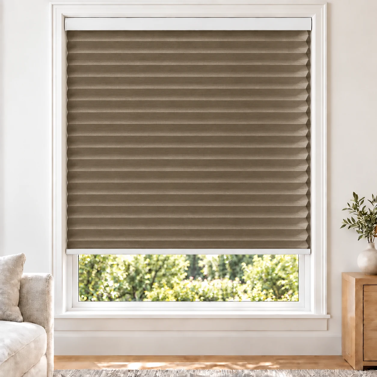 Warm Taupe 38mm honeycomb cellular blind in a bright neutral living room, fabric LTH14-38, 70% shading