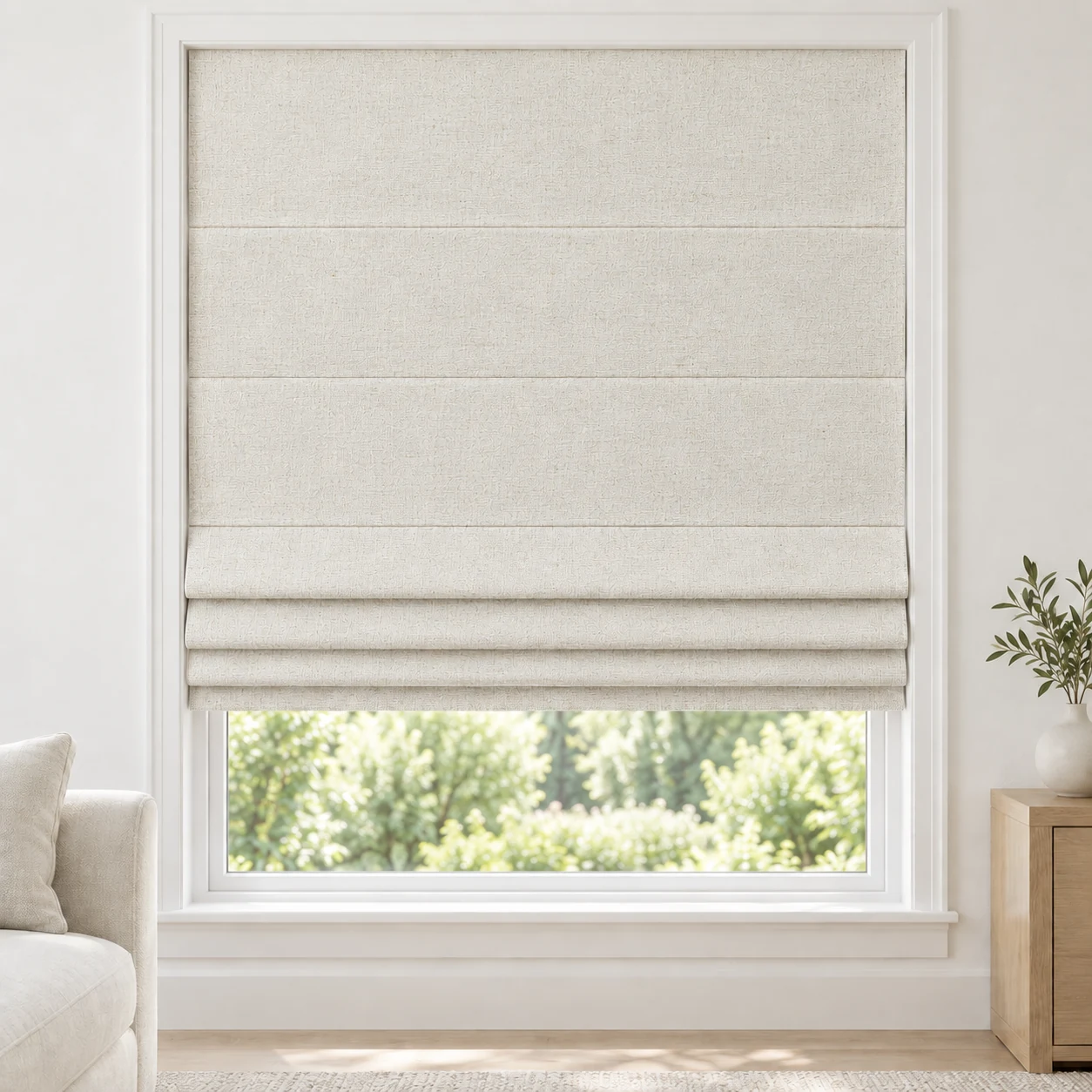 Cream Ivory cordless Roman shade with a softly textured linen-style weave in a styled living room, blackout, fabric BMF06