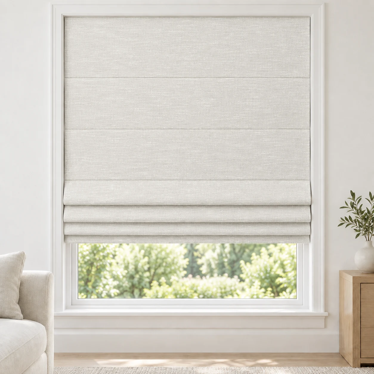 Warm White cordless Roman shade with a softly layered woven texture in a styled living room, blackout, fabric BML01