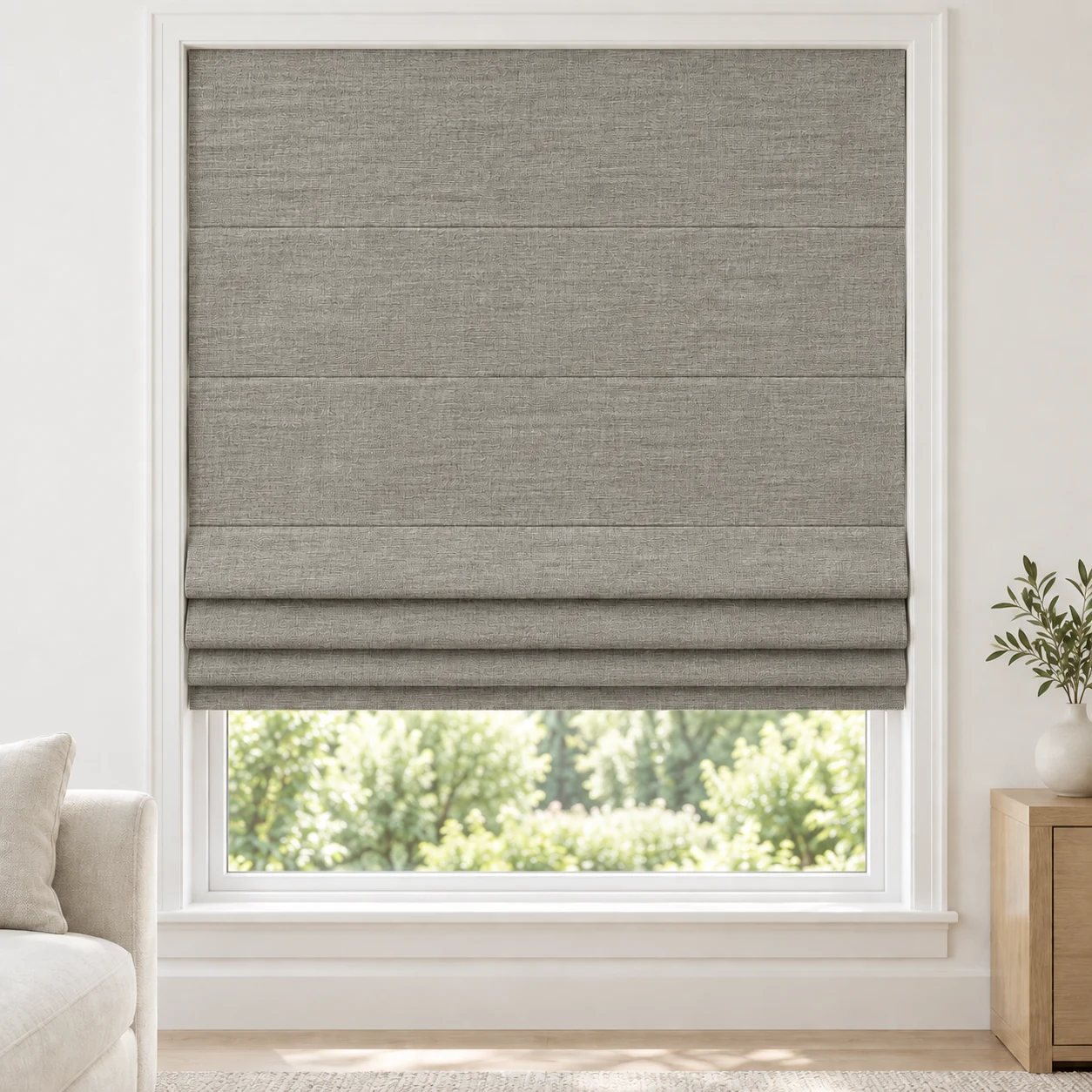 Warm Grey cordless Roman shade with a softly layered woven texture in a styled living room, blackout, fabric BML03
