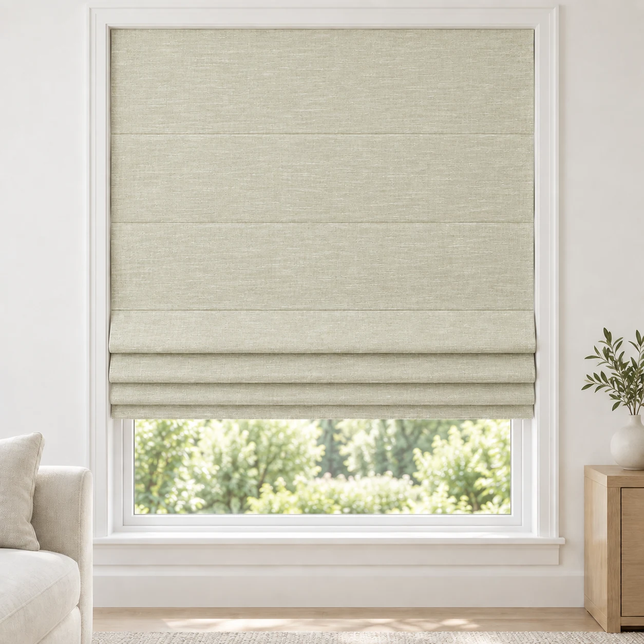 Vanilla Ivory cordless Roman shade with a softly layered woven texture in a styled living room, blackout, fabric BML06