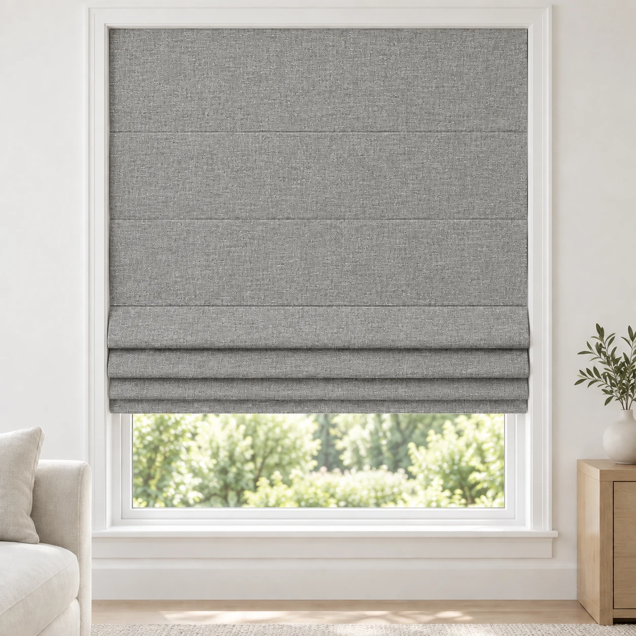 Cool Grey cordless Roman shade with a fine, even linen-style texture in a styled living room, blackout, fabric BSM06