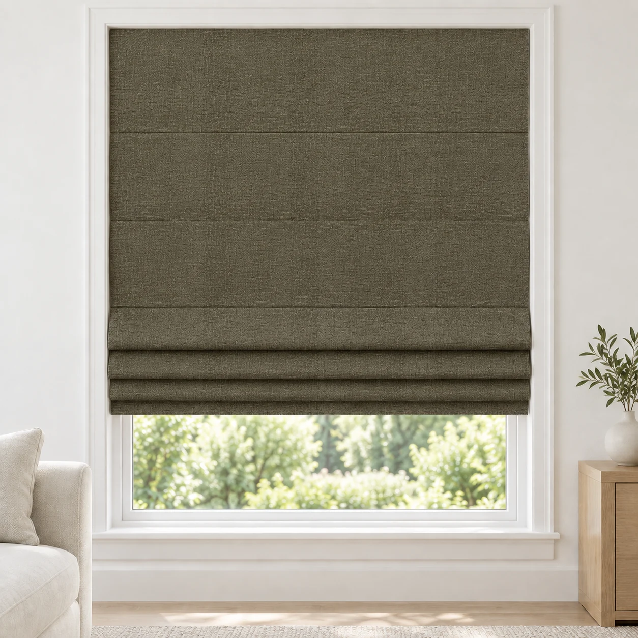 Olive Bark cordless Roman shade with a subtle crosswoven texture in a styled living room, blackout, fabric BTW05