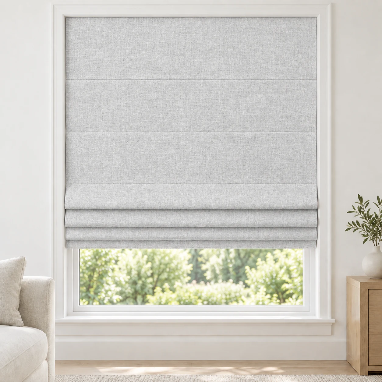 Silver White cordless Roman shade with a softly layered woven texture in a styled living room, blackout, fabric BXY01