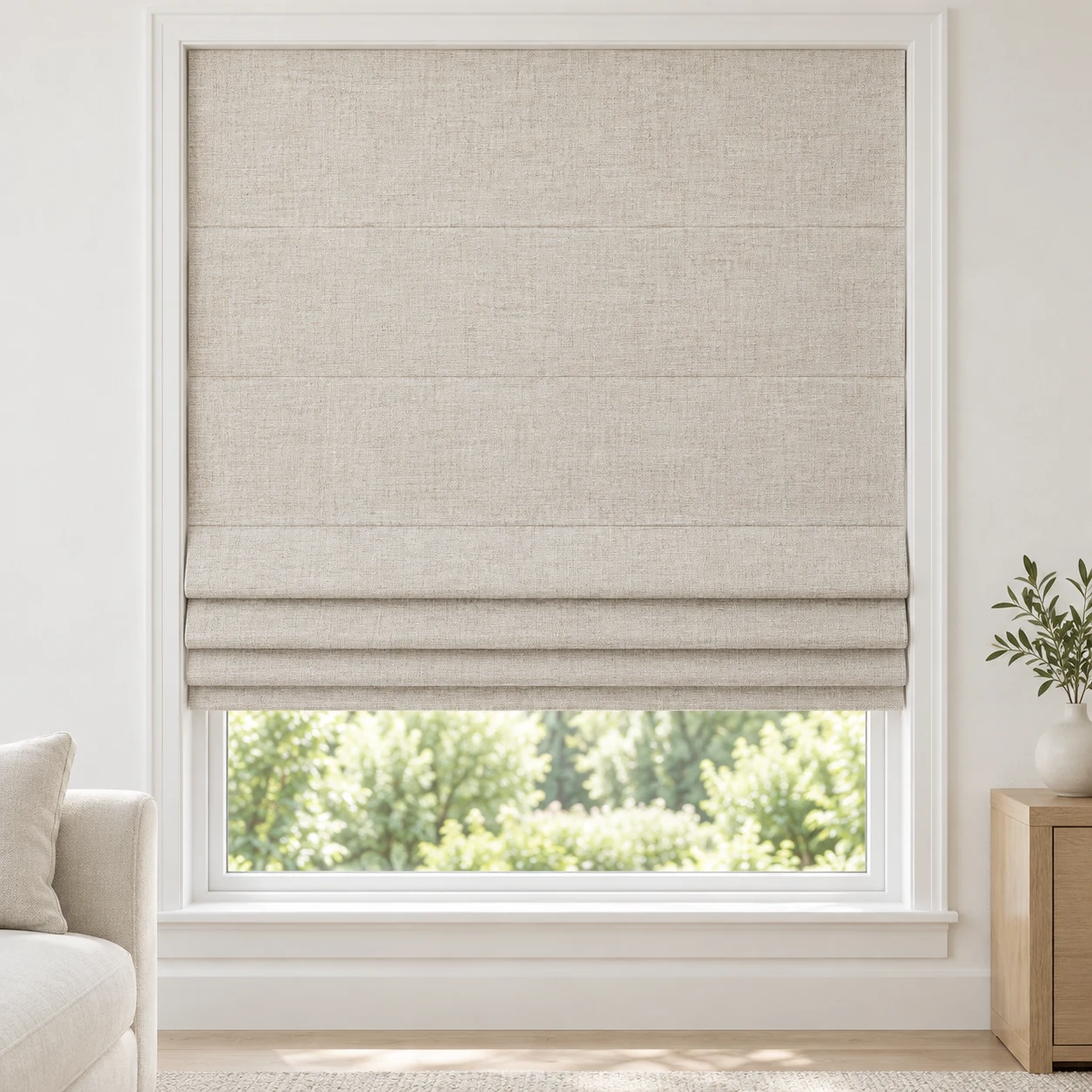 Oatmeal Ivory cordless Roman shade with a fine linen-style weave in a styled living room, blackout, fabric BYM06