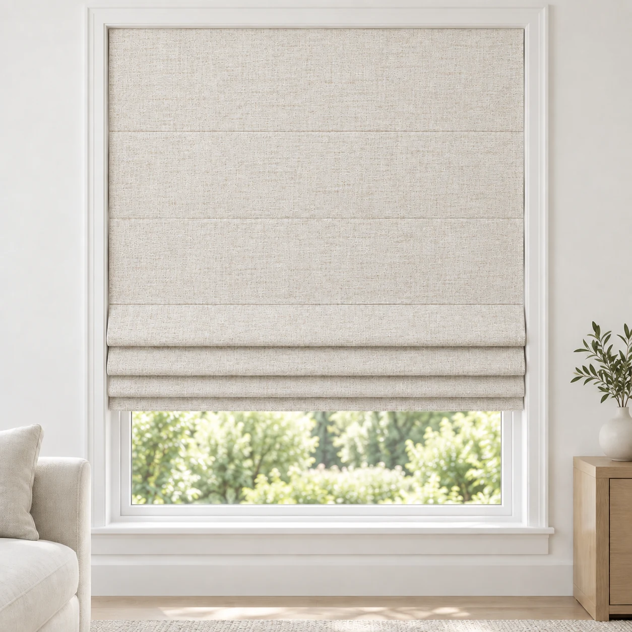 Linen Ivory cordless Roman shade with a fine linen-style weave in a styled living room, blackout, fabric BYM25