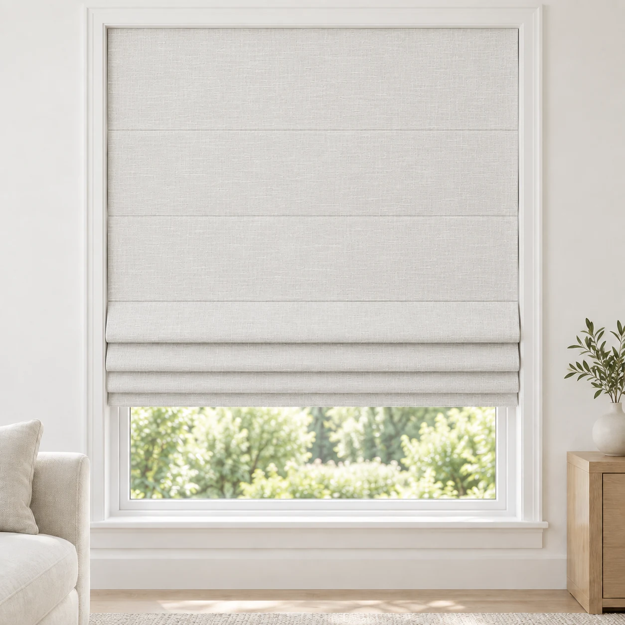 Ivory White cordless Roman shade with a fine, softly striped texture in a styled living room, light filtering, fabric HMY01