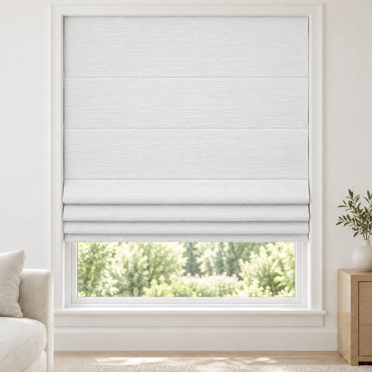 Soft White cordless Roman shade with a fine horizontal stripe in a styled living room, light filtering, fabric LMK01