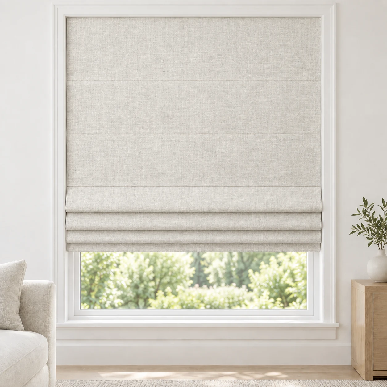 Warm Ivory cordless Roman shade with a delicate woven texture in a styled living room, light filtering, fabric LXY06