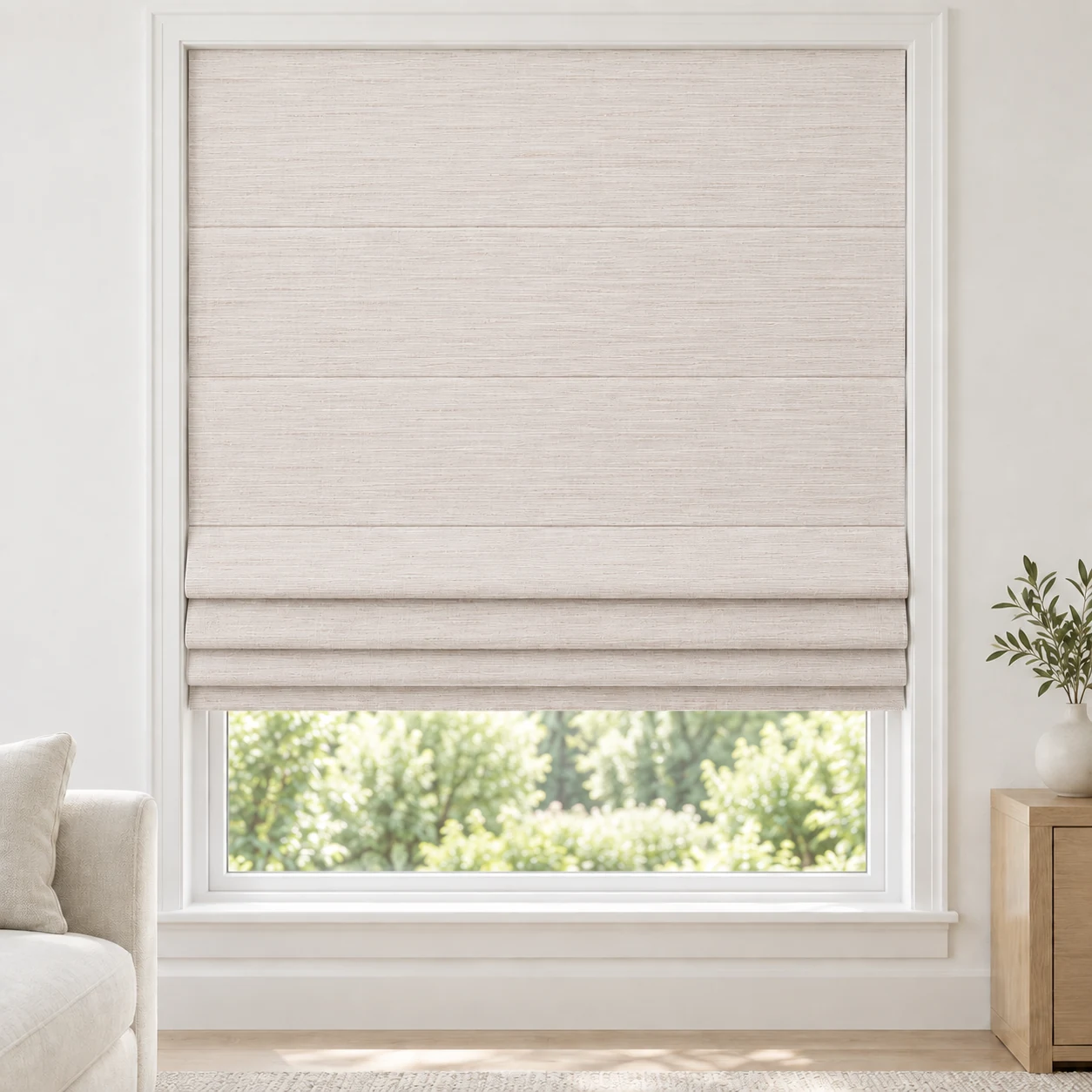 Blush Ivory cordless Roman shade with a delicate horizontal stripe in a styled living room, light filtering, fabric LYU25