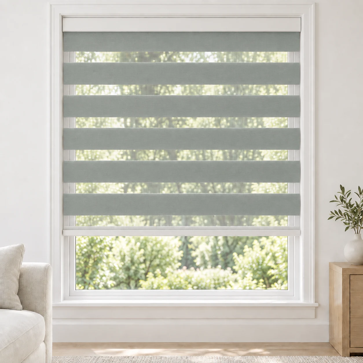 Sage Gray cordless zebra blind in a living room, fabric SSL09