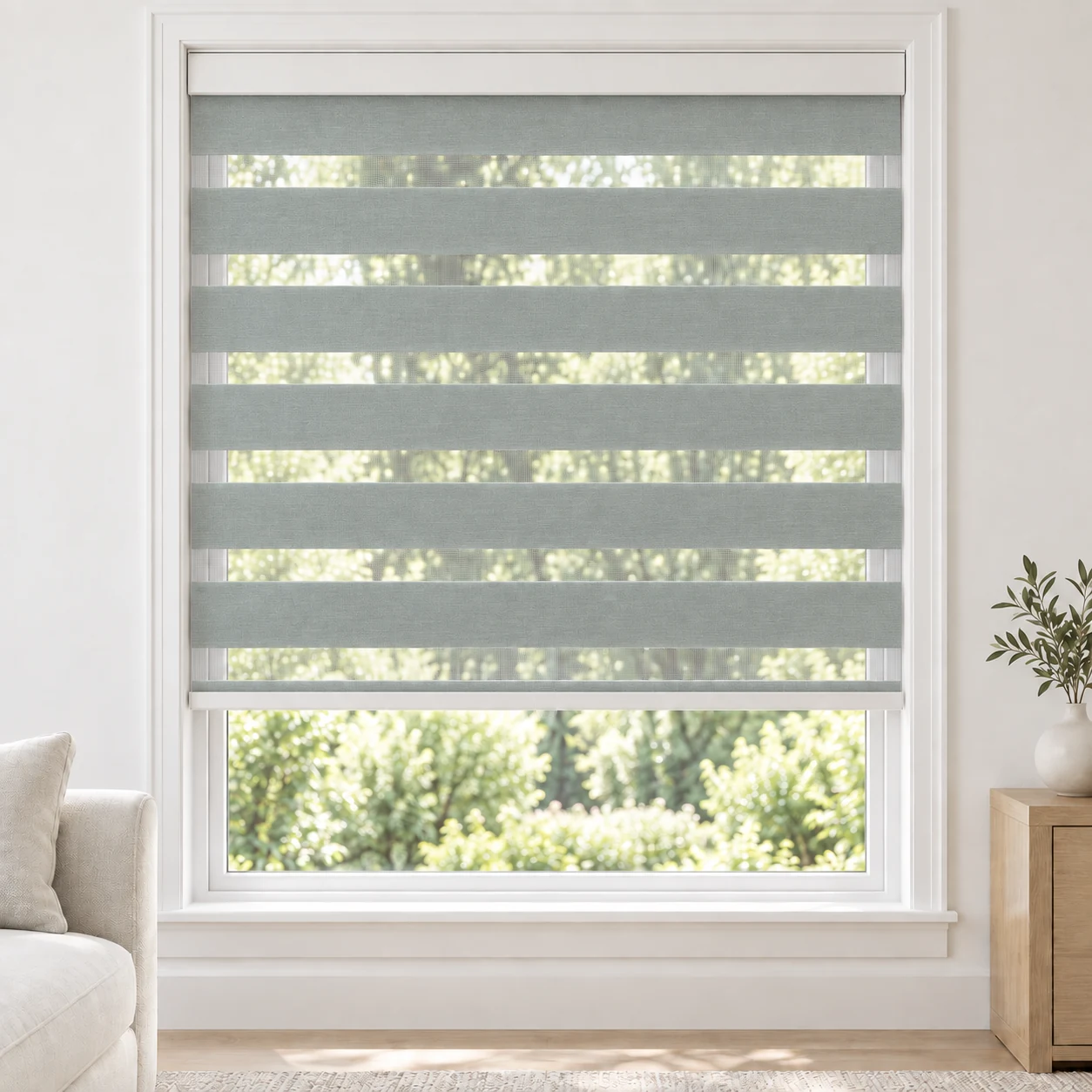 Mist Gray cordless zebra blind in a living room, fabric SSL14