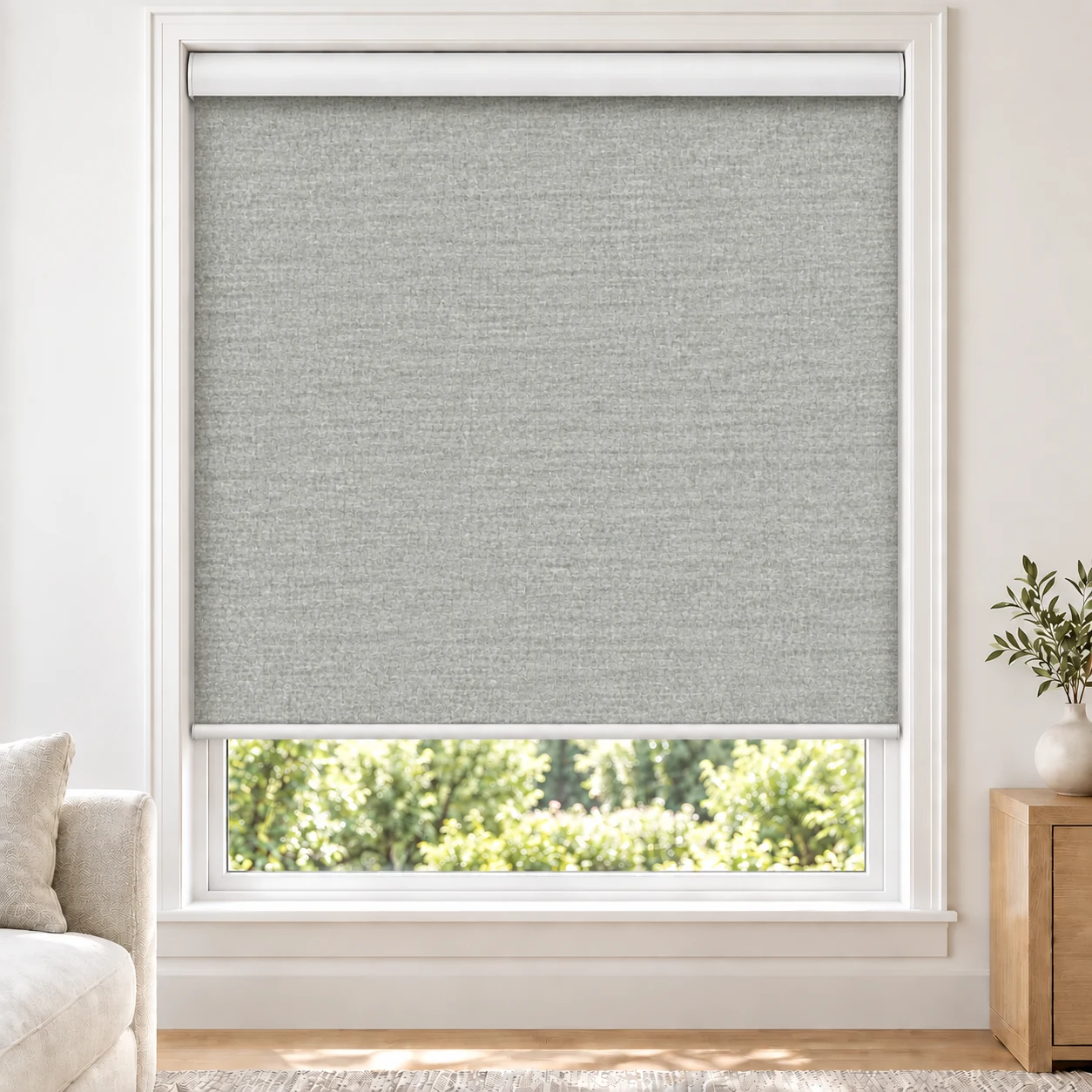 Pewter Grey ADORO standard roller blind in a bright living room, blackout, fabric ADORO-PEWTER-BO