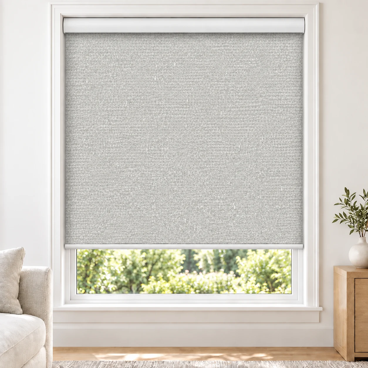 Soft White CABO standard roller blind in a bright living room, blackout, fabric CABO-WHITE-BO