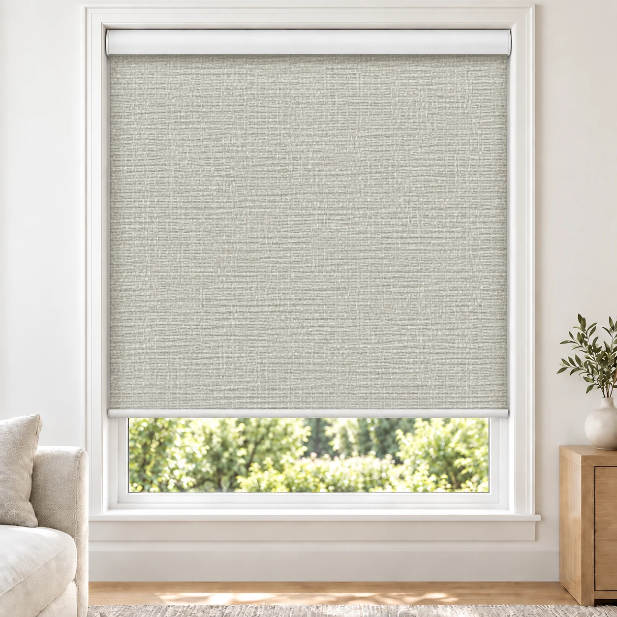 Oyster GRACE standard roller blind in a bright living room, light filtering, fabric Grace-Oyster-LF