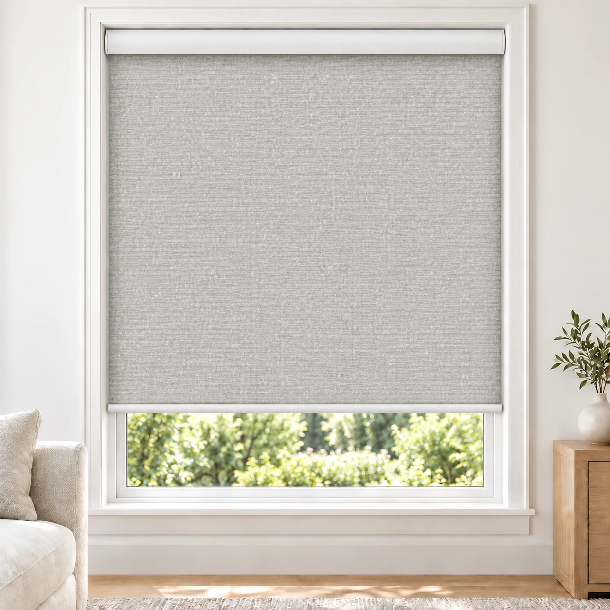 Snow White GRACE standard roller blind in a bright living room, light filtering, fabric Grace-Snow-LF