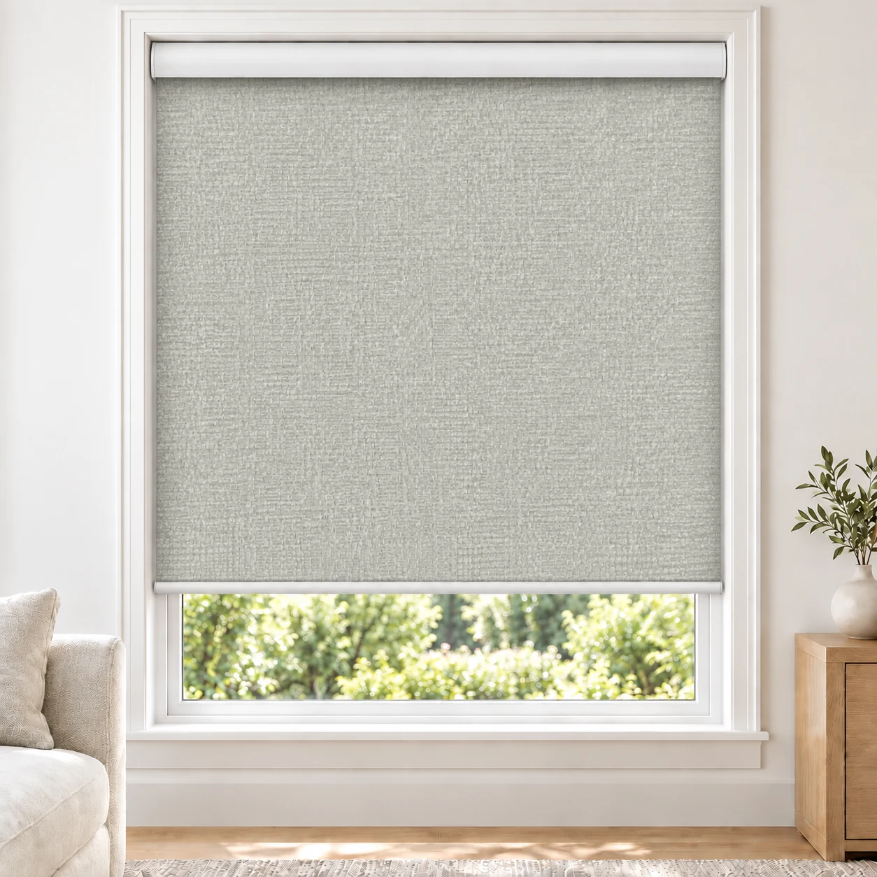 Stella GRACELUNA standard roller blind in a bright living room, blackout, fabric GraceLuna-Stella-BO