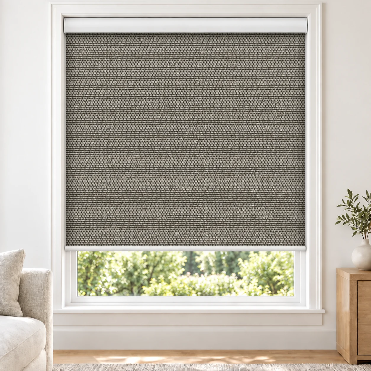Raven Black MIRAGEMOON standard roller blind in a bright living room, blackout, fabric MirageMoon-Raven-BO