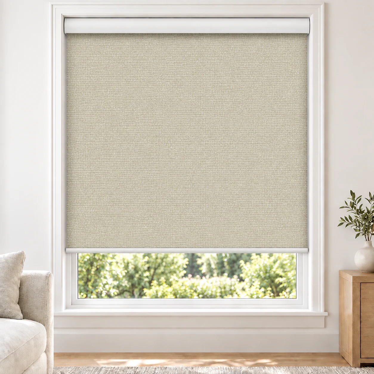 Alabaster OMEGA5PCT standard roller blind in a bright living room, light filtering, fabric OMEGA5PCT-ALABASTER