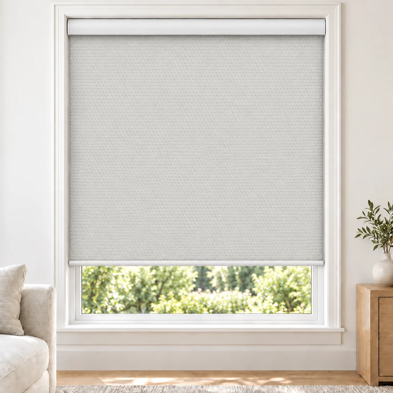 Soft White PRIME standard roller blind in a bright living room, blackout, fabric PRIME-WHITE-BO