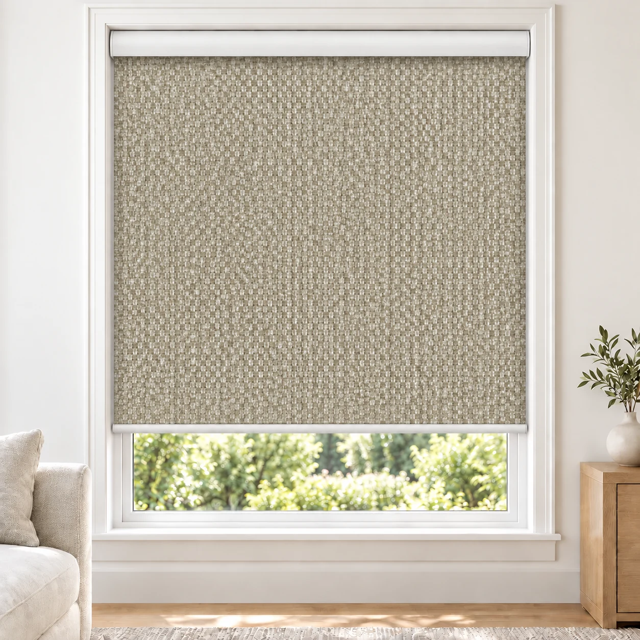 Sand Beige R1001 standard roller blind in a bright living room, light filtering, fabric R1001-Beige-LF