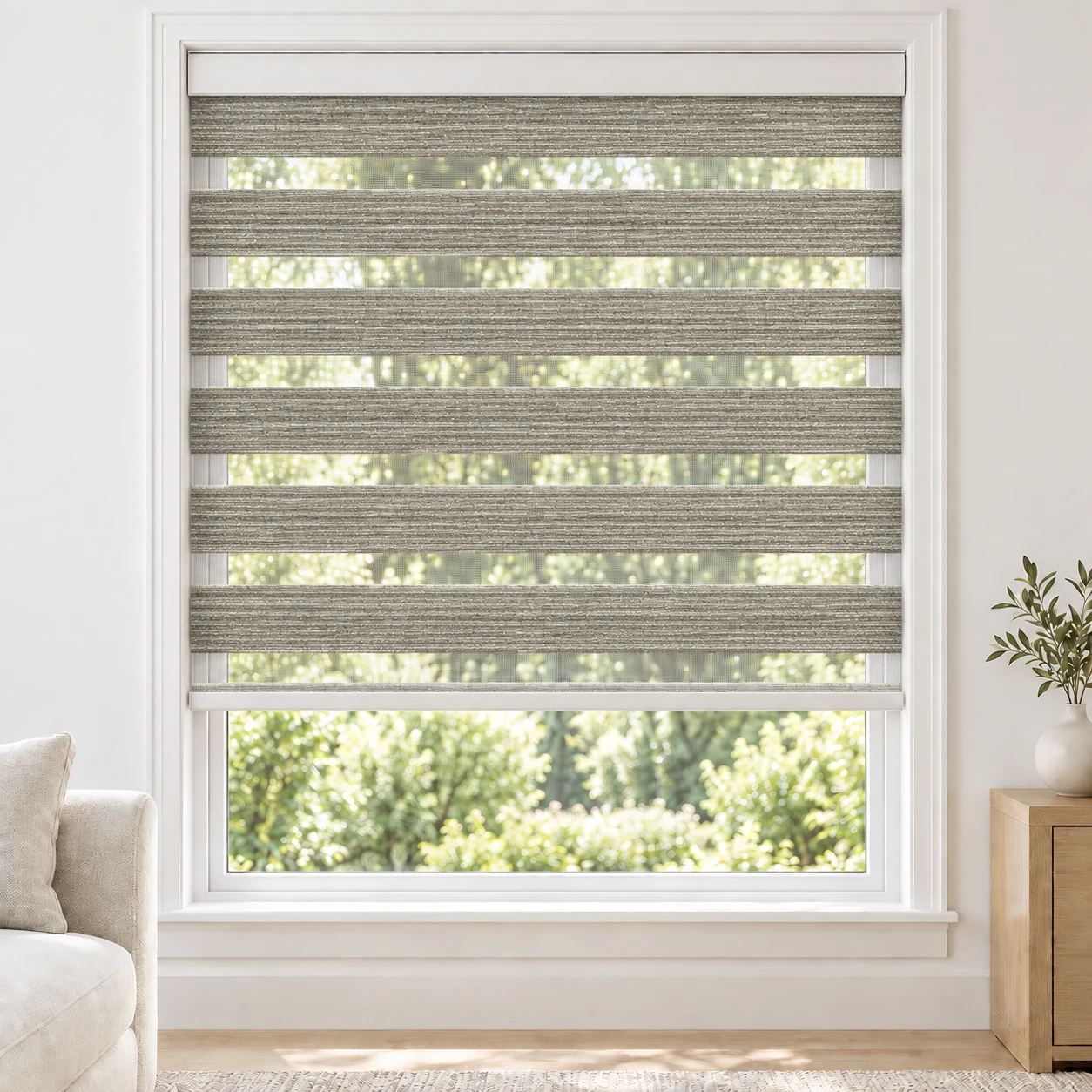 Mist Grey AQUAWIDE4 standard zebra blind with alternating fabric and sheer bands in a bright living room, AQUAWIDE4-LGRAY-LF