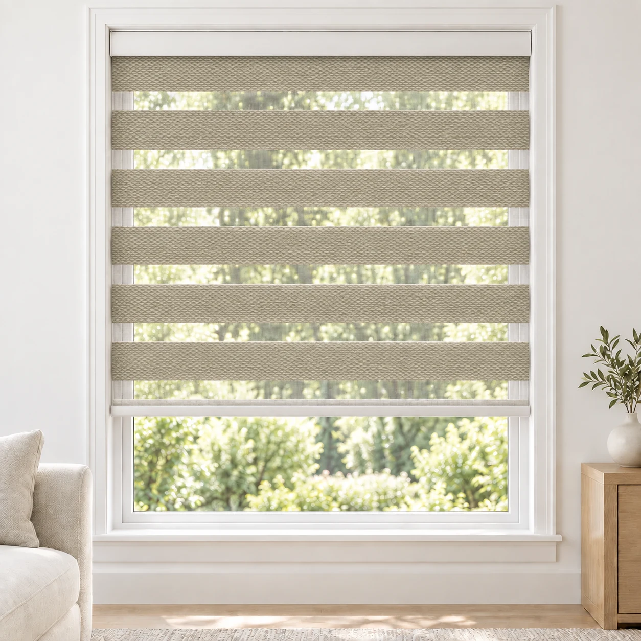 Warm Ivory Bilford standard zebra blind with alternating fabric and sheer bands in a bright living room, Bilford-Ivory-DO
