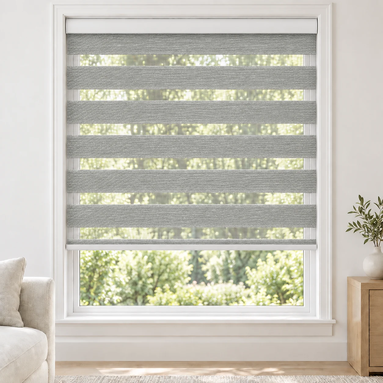 Soft White Bophia standard zebra blind with alternating fabric and sheer bands in a bright living room, Bophia-White-DO