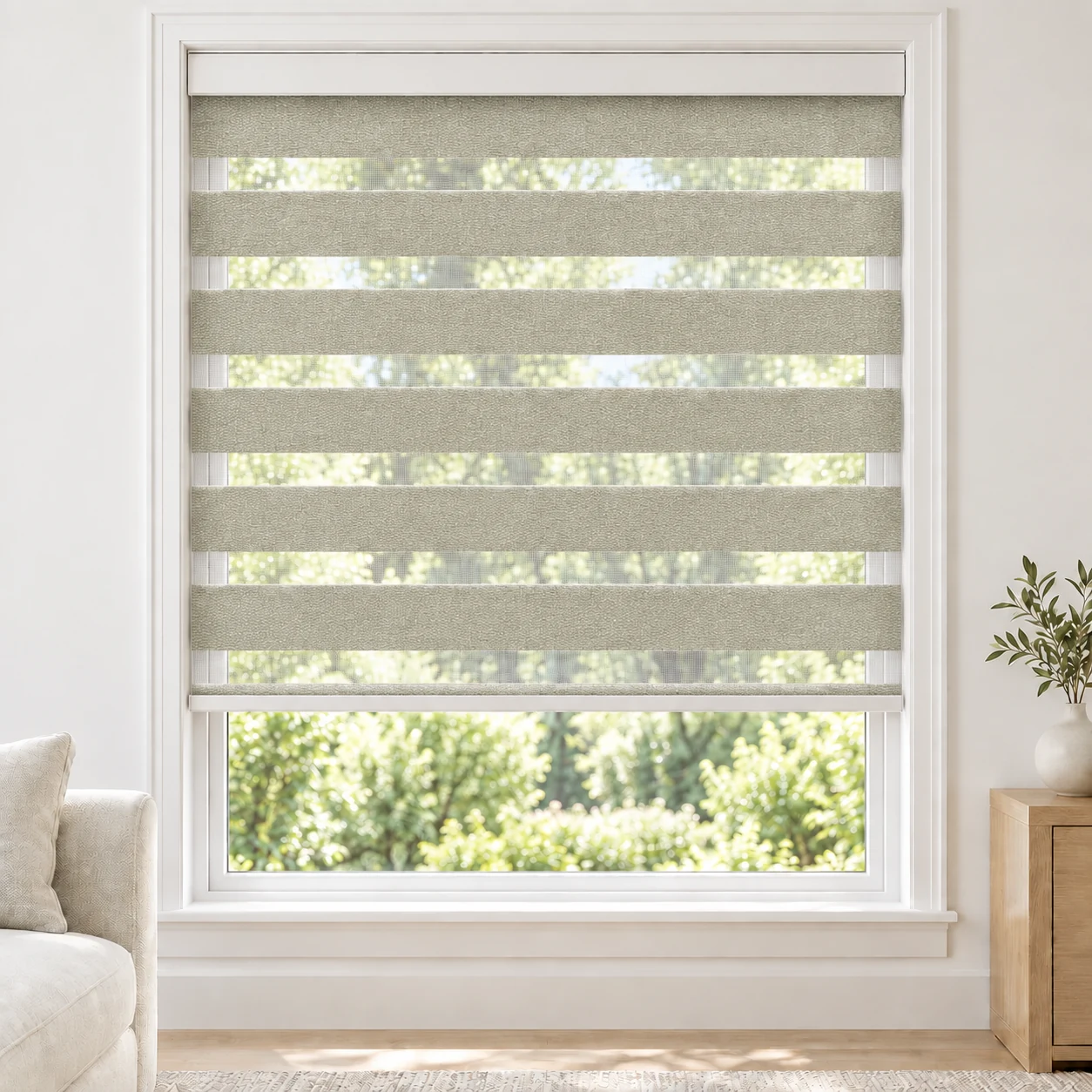 Warm Ivory LUCCA1TONE standard zebra blind with alternating fabric and sheer bands in a bright living room, LUCCA1TONE-IVORY-LF