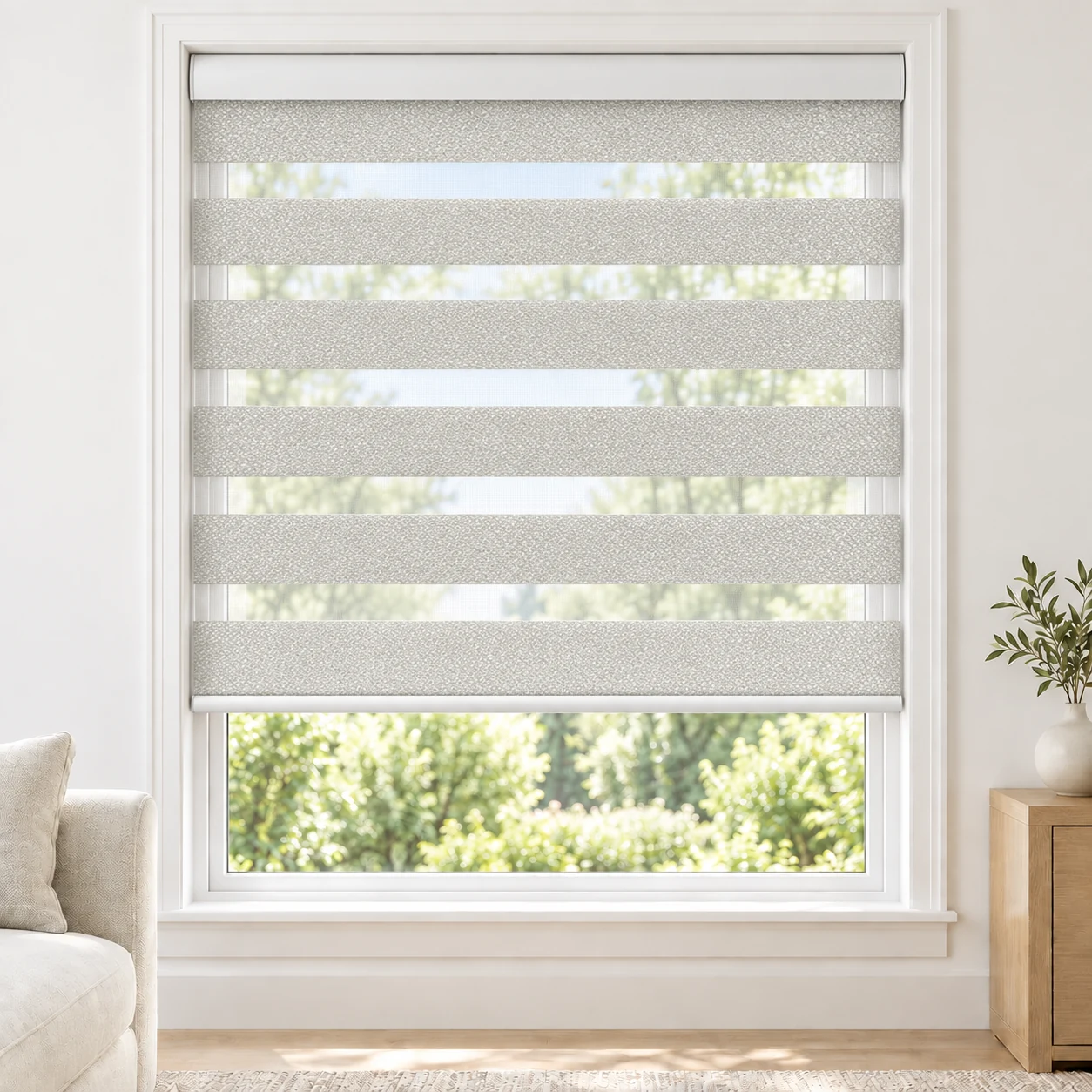Soft White LUCCAWIDE1TONE standard zebra blind with alternating fabric and sheer bands in a bright living room, LUCCAWIDE1TONE-WHITE-LF