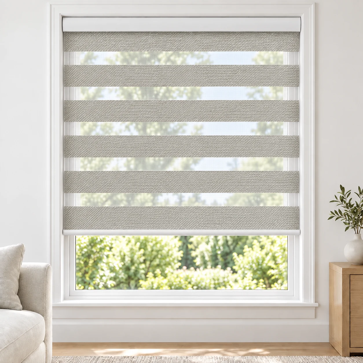 Soft White LYNDA standard zebra blind with alternating fabric and sheer bands in a bright living room, LYNDA-WHITE-LF