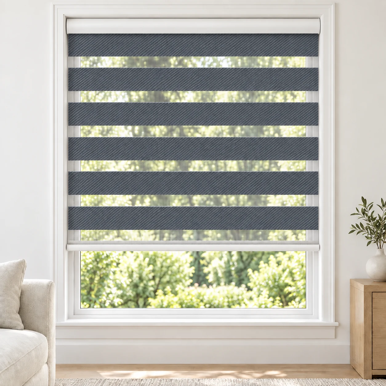 Blue Grey NOGUCHI standard zebra blind with alternating fabric and sheer bands in a bright living room, NOGUCHI-GREY-BO