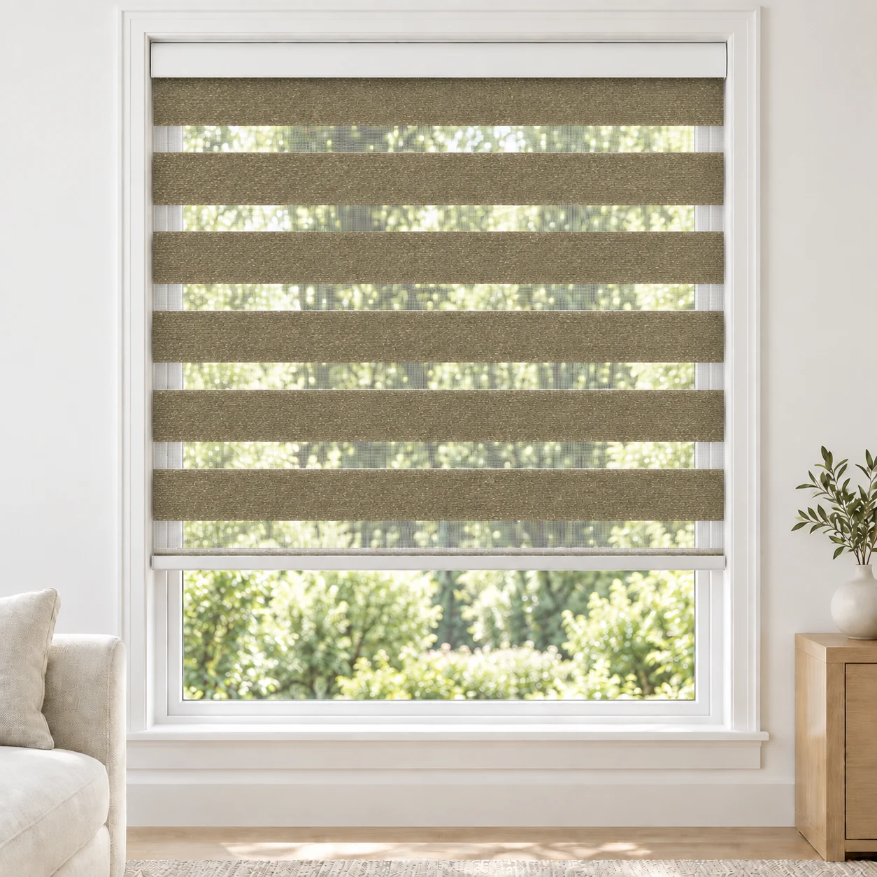Warm Ivory PARDA standard zebra blind with alternating fabric and sheer bands in a bright living room, PARDA-IVORY-LF
