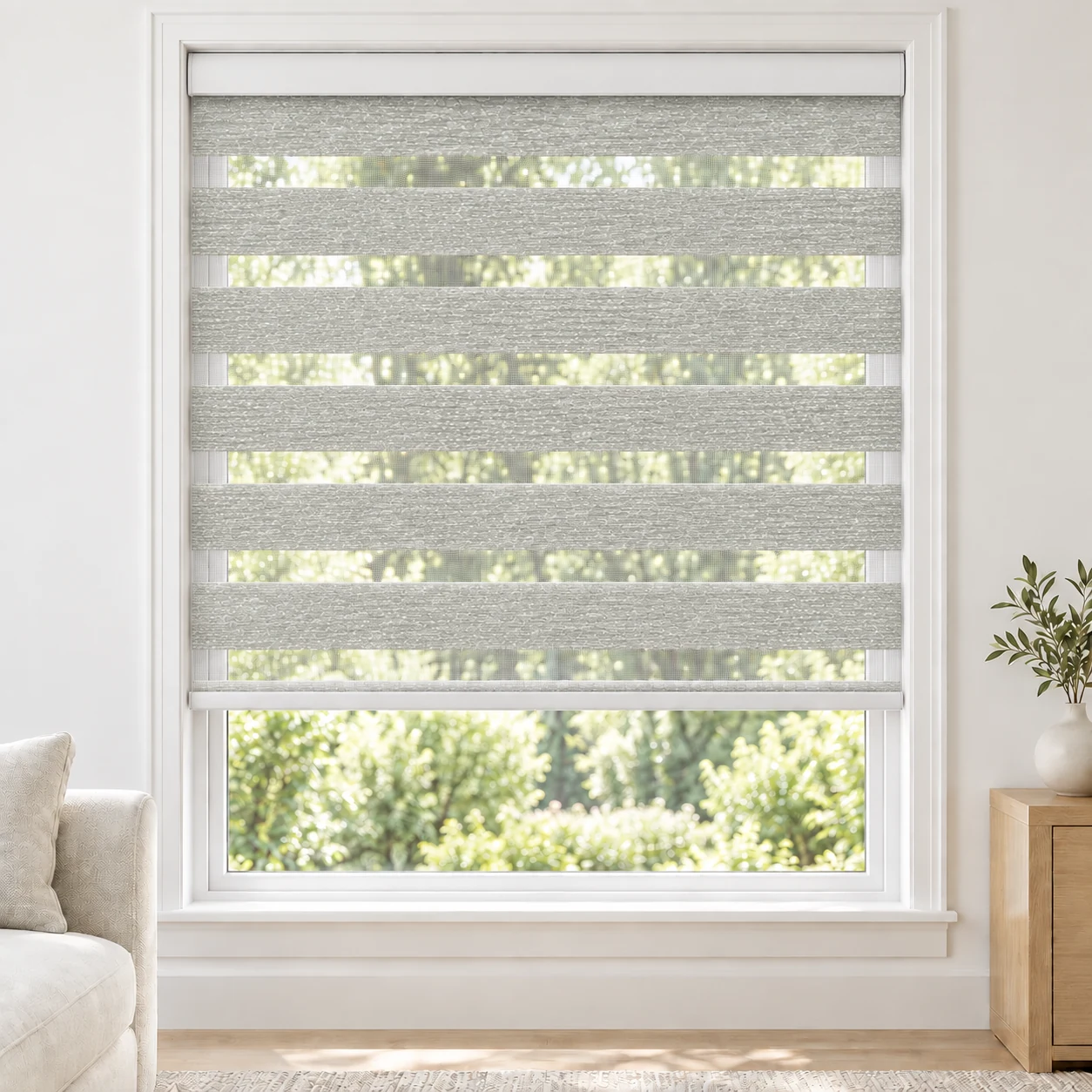 Soft White PARDA standard zebra blind with alternating fabric and sheer bands in a bright living room, PARDA-WHITE-LF